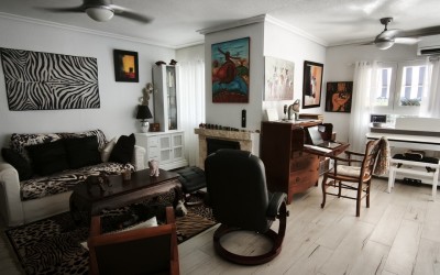 A fully renovated corner bungalow with a large garden.